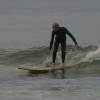 Arjen backside surfing his wooden 9'0 @ Haamstede 23.11.03