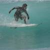 Local surfer riding a clean wave @ Sandy Lane 19.01.04