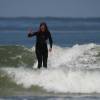 Paula surfing her first wave on her new NSP 8'6 South Point longboard@da Northshore of Renesse 16.04.04