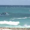 Fisher boat & windsurfer @ Seascape Beach House