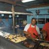 Uncle George grillin da fresh fish @ De Fishnet Barbados
