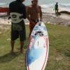 Alberto taking a closer look@Marios board@Windfest 2006 @ Surfers Point Barbados
