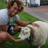 Brian Talma interacting with a sheep @ Windsurfing Renesse 17.05.06