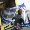 Brian Talma taking his rigged sail from da WSR van @ 15 years Windsurfing Renesse 20.05.06