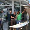 Myrthe winning a bottle of Barbados rum @ da conch shell contest @ 15 Years Windsurfing Renesse