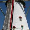 Brian Talma blowing da conchshell on a dutch windmill @ Windsurfing Renesse 18.05.06