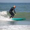 Arjen surfing his new Mc Tavish 9'1
