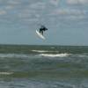 A slingshot team rider taking some air @ da Surf & Kite Event Brouwersdam 2002