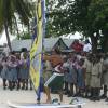 Brian Talma explaning the schoolchildren of Barbados about windsurfing
