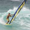 Brian Talma riding a wave @ Surfers Point Barbados