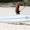 Arjen going out on a stand up paddle surfboard @ Brian Talma's Action beach Barbados