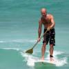 Arjen stand up paddle surfing  a wave @ Silver Rock Barbados