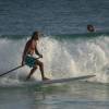 Brian sup surfing whilst Kevin is watching @ South Point Barbados