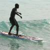 Lifeguard surfing his rescueboard @ Miami Beach Barbados