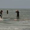 Patrick Bongers surfing the McTavish 9'1 Arjen paddling out @ Nieuw-Haamstede