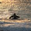 Arjen paddling out in the sunset @ Vuurtorenpad Nieuw-Haamstede