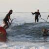 Brian Talma taking a wave on his Starboard 12'2 @ Renesse's Northshore