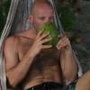 Arjen drinking a home grown coconut @ Seascape Beach House Barbados
