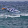 Brian Talma looping on the reef being watched by a kiter @Silver Sands Barbados