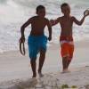 Boys showing their catch of the day @ Silver Sands Barbados