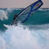 Arjen riding a big set @ Seascape Beach House Barbados