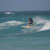 Longboarder riding a long wave 2 @ Long Beach