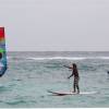 Brian Talma teaching from his paddleboard @ Silver Sands Barbados