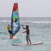 Brian Talma giving instructions from his paddle board @ Silver Sands Barbados