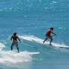 Brian & Kevin Talma suping the same wave @ the Barbados Watermen Festival 2008
