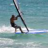 Arjen riding the wave with the sup @ Silver Rock Barbados