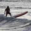 Brian Talma sup surfing on Arjen's board @ Surfers Point Barbados