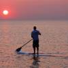 Arjen stand up paddlesurfing towards the sun @ da Brouwersdam