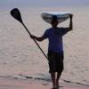 Stefan comming out the water after a sunset sup session @ da Brouwersdam