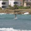 Surfergirl Cherrian riding a wave @ Ocean Spray Apartments