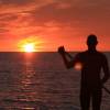 Arjen stand up paddlesurfing in the sunset @ da Brouwersdam