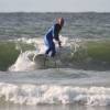 Arje sup surfing a wave @ Renesse Northshore