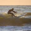 Arjen surfing his McTavish 9'1 Original in the sunset @ Nieuw-Haamstede