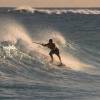 Paddleboarder noseriding @ Surfers Point