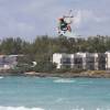 Steve flying with the Ocean Spray Apartments in the background