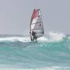 Jumping over a clean blue breaker @ Surfers Point